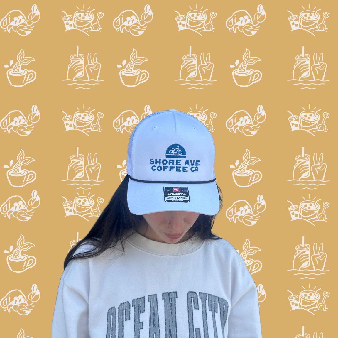 Shore ave white trucker hat on a girl